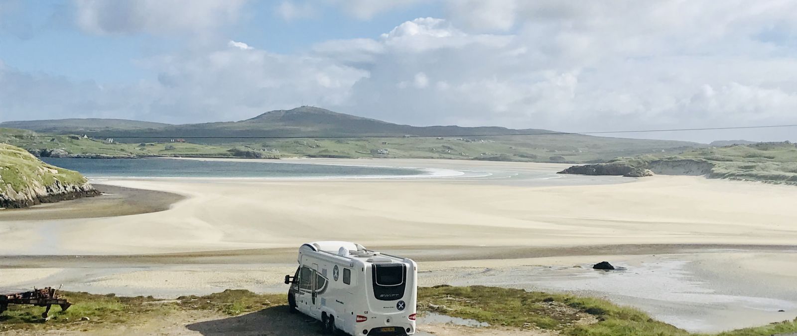 Scottish Tourer Motorohme parked on the beach