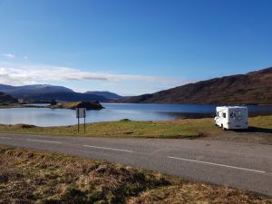 motorhome parked up by loch side